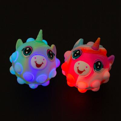 China Funny Educational Toy Relieve Stress Games 3D Rainbow Glow Unicorn Bubble Jumping Person Toy Balls for sale