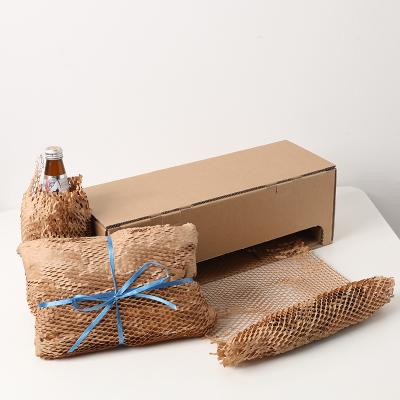 China Recyclable Honeycomb Wrapping Kraft Paper Dispenser Set Cushion Paper Honeycomb Wrapper for sale