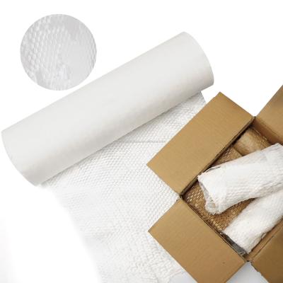 China Recyclable 500mm*50m Recyclable White Honeycomb Paper Wrapping Kraft Paper Packing Cushion Paper for sale