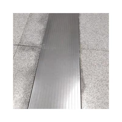 China Industrial Concrete Stainless Steel Floor Aluminum Expansion Joint Water Drainage Warp Joint Cover for sale