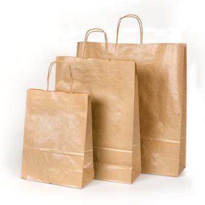 China Recyclable Custom Disposable Colorful Stand Up Block Bottom Flat Bottom Kraft Paper Bag Candy Gift Paper Bag With Handle for sale