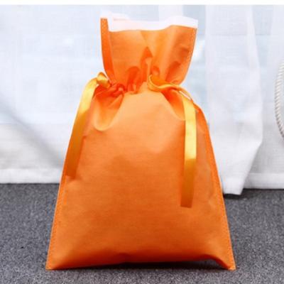 China Samll Sales Hot Multicolor Drawstring Blank Candy Bag Eco-friendly Customization Advertising Package Non Woven Fabric Dustproof Pouch for sale