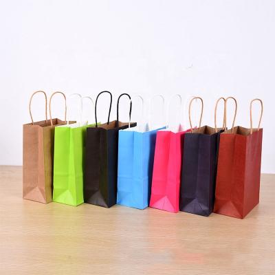 China Recyclable Eco Friendly Environmental Bag Customized Logo Multi Color Price Kraft Paper Bag Easily Carry Wholesale Cheap for sale