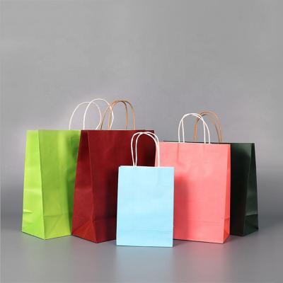 China Wholesale Cheap Price Luxury Custom Large Size Logo Handle Packaging Brown Kraft Paper Bag Recyclable for sale