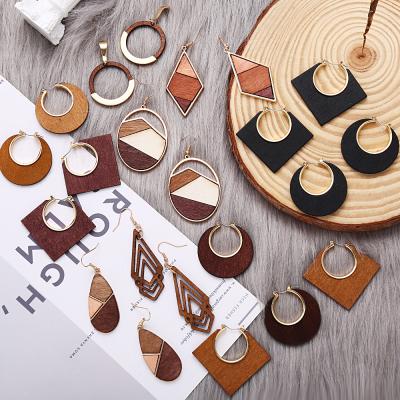 China TRENDY Classic Natural Wooden Hollow Dangle Earrings For Women Shape 3 Color Splice Geometric Circle Wooden Earrings for sale