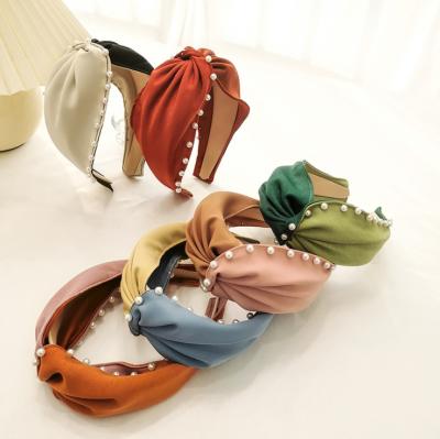 China Fashion new solid color fabric the cross headband color matching pearl for sale