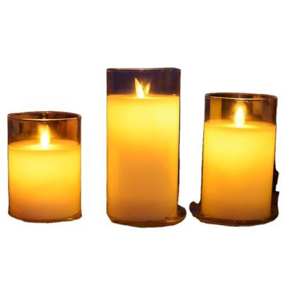 China Real flame best-selling parties pillar candle glass transparent jar home decoration led scented candles for sale