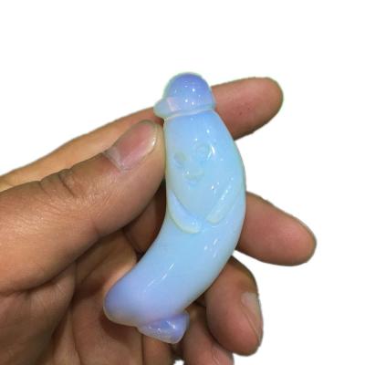 China China Natural Quartz Banana Polishing Crystal Opal Carving Man for sale