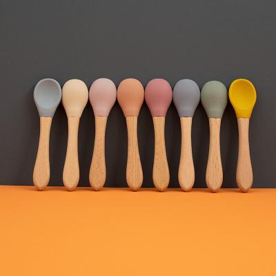 China Baby Feeding Spoon Silicone Soft Wood Wooden Baby Spoon Organic Soft Tip Spoon Food Grade Toddlers Handle Materials Gifts for sale