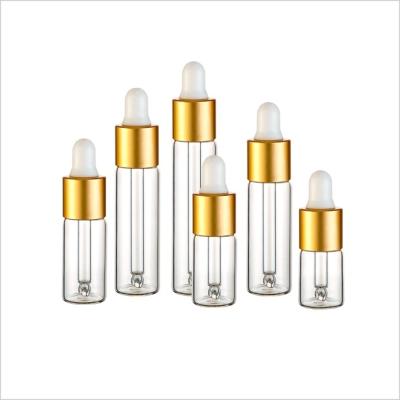 China Gold Cap Cosmetic Glass Bottle 3ml 4ml 5ml 7ml 8ml 10ml Recycled Glass Cosmetic Packaging for sale