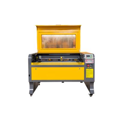 China Laser CUTTING laser engraving machine 9060 ruida 100w CO2 laser engraving and cutting machine for sale