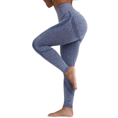 China Women's Jogging Hollow Out Yoga Clothing Seamless High Fitness Breathable Waist Sports Slim Yoga Pants Gaiters for sale