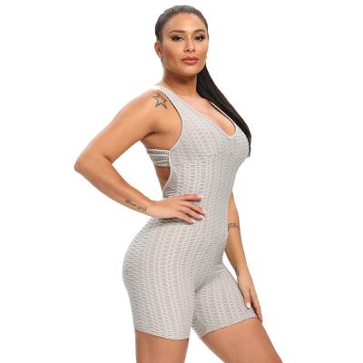 China Tiktok Breathable Jacquard Overalls Equipment Women One Piece Bra And Pants Set Cross Back Shorts Pants Yoga Sports Fitness Suit Slim Fit for sale