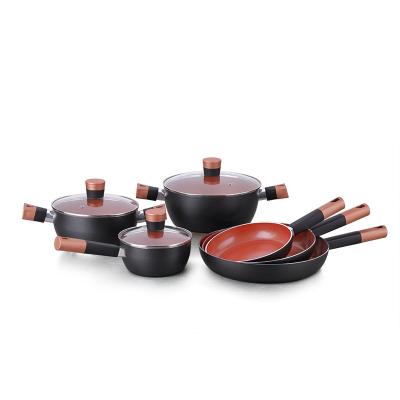 China Durable Pressed Aluminum Copper Heat Resistant Black Color Non Stick Cookware Sets With Glass Lids for sale