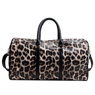 China Wholesale PU Leopard Print Women Weekender Leather Luggage Bag Fashion Waterproof Travel Duffel Bag With Strap for sale