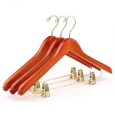 China Luxury Solid Wood Eco-friendly Material Hanger Pants Hanger With Clips Quality Custom Pants Hanger for sale