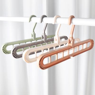 China With Cheap Staples Amazon Top Selling Wholesale 9 Holes Folding Hangers Luxury Magic Hanger for sale