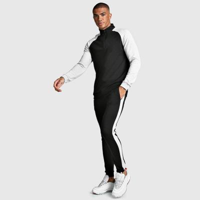 China Breathable Custom Mens Running Tracksuits Set Raglan Sleeves Mock Collar One Quarter Zipper Contrast Panel Sweatsuit for sale