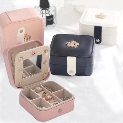 China Factory Wholesale Simple PU Jewelry Storage Box Leather Portable Earring Rings Necklace Mirror Jewelry Box Travel for sale