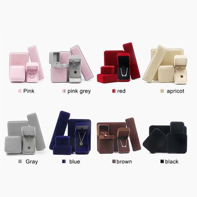 China Custom Logo Jewelry Packaging Box Plastic Velvet Earrings Necklace Ring Jewelry Rounded Flannel Jewelry Box Jewelry Gift Box for sale