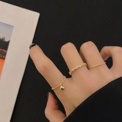 China The other Korean version of the new INS copper plated real 18K gold full diamond index ring three-piece tassel ring for sale