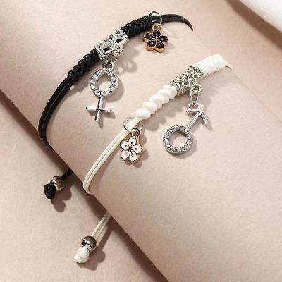 China Hot Selling Hiphop Fashion Personality Simple Flower Couples Adjustable Weave Bracelet Pairs for sale