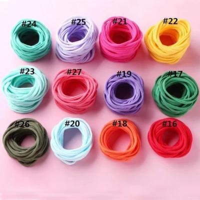 China The popular baby's headband is fashionable, soft, no strangulation marks, the baby's headband is 2cm wide, nylon hair ornament for sale