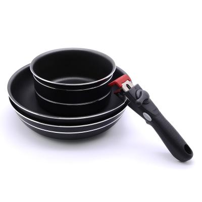 China Non Sustainable Stick Cookware Set Round Frying Pan Pot With Removable Handle Customized for sale