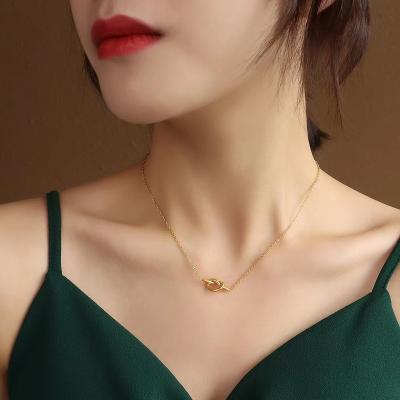 China New Europe and America stainless steel simple knotted heart-shaped pendant necklace for sale