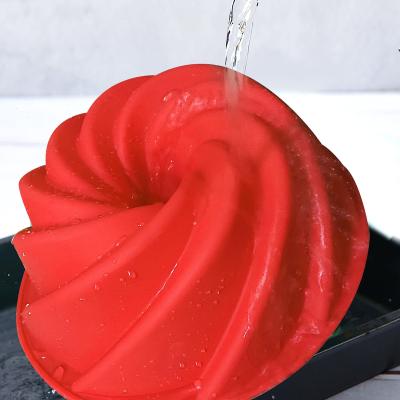 China Dongguan Guangdong Youle Viable Nonstick Spiral Cake Mold Donut Pan Flower Pot Silicone Molds for sale