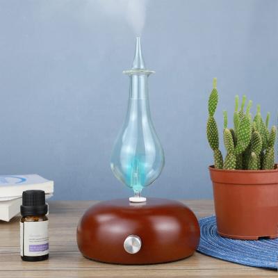 China 2019 Humidifier Aroma Essential Oil Nebulizing Diffuser Wooden Glass Aroma Nebulizer 7 Color Changing LED Lights for sale