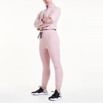 China Custom Workout Anti-UV 95%Cotton 5%Spandex Gym Clothing Tracksuits With Zipper Hoodies And Tapered Sports Tracksuit For Women for sale