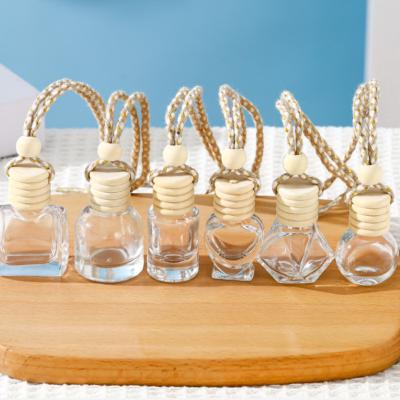 China Gift & Craft Wholesale Car Hanging Diffuser Bottle Pendant Essential Diffuser Oil Fragrance Aromatherapy Empty Bottle for sale