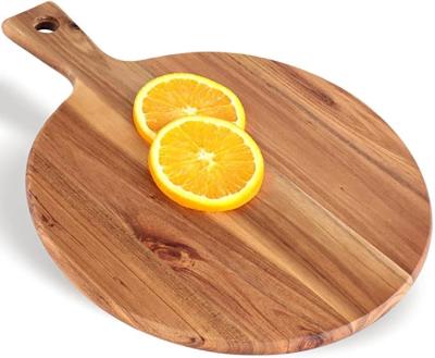 China Amazon Wholesale Good Quality Viable Hot Bamboo Chopping Board Cutting Plates With Holes for sale