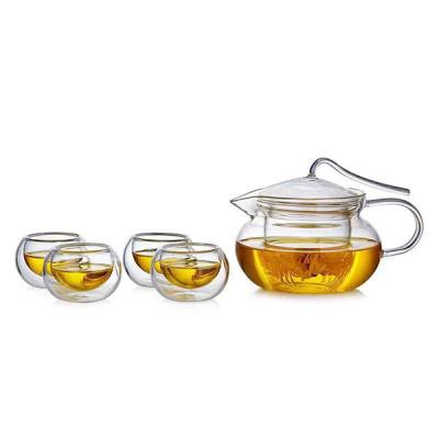 China Viable Stock Items Heat High Borosilicate Glass Tempered Teapot Set With Tea Infuser With 4 Pcs Small Glass Tea Cups for sale