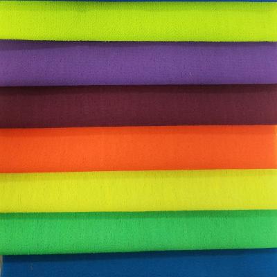 China Antistatic 100% Polyester Body Towel Bath Shower Fabric Exfoliating Tissue Viscose Exfoliating Tissue Cloth for sale