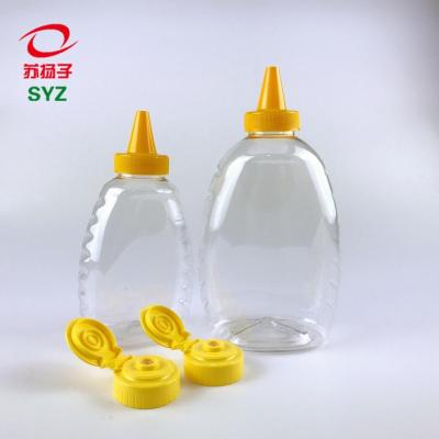 China High Quality Food 450ml / 750ml Honey Squeeze Plastic Bottle Clear PET With Silicone Screw Cap Or Lid for sale