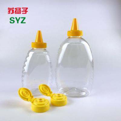 China Beverage Food Grade Plastic Container For 450ml/750ml Empty Honey Squeeze Bottle Honey Bear PET Cute Plastic Bottles for sale