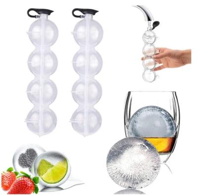 China DIY Silicone Ice Maker Whiskey Ice Hockey Four Hole Mold Round Plastic Ice Ball Mould for sale