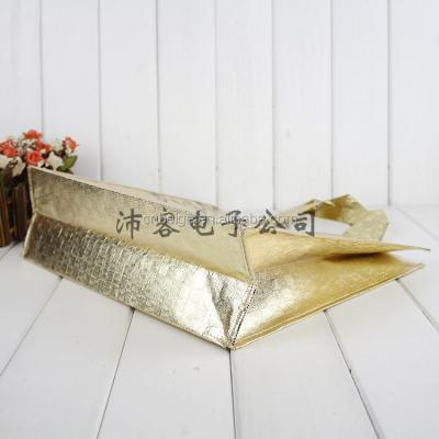 China Low Price Waterproof Golden Tote Beach Metallic Nonwoven Bags for sale