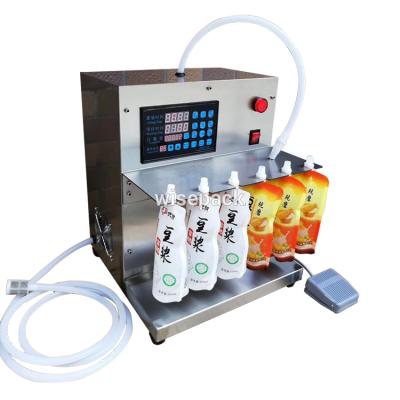 China Mini Semi Automatic Food Juice Spout Pouch Filling Machine for sale