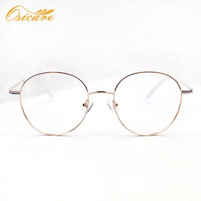 China Two-tone slim metal frame; Adjustable nose guards; The latest new vintage round and two-tone frames 2020 designer glass metal eyeglasses for sale