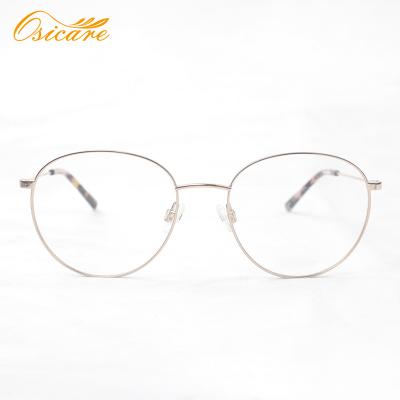 China Slim gold metal frame; Adjustable nose guards; 2021 newest brand designer two-tone round eyewear and thin classic double color metal glasses frames for sale