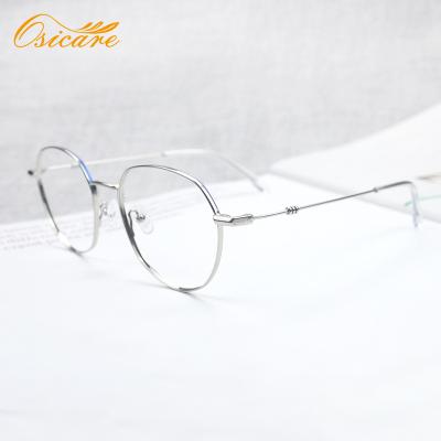 China Two-tone slim metal frame; Adjustable nose guards; Fashion designer latest new style metal slim optical frame and original high quality round metal glasses for sale