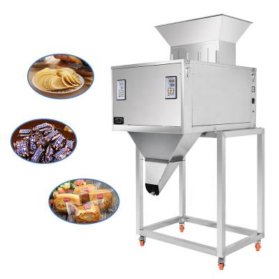 China Food Puffed Foods Biscuits Candy PastaSeasonings Nuts Beans Herbal Tea Dual Weighing Quantitative Filling Packing Machine Semi-Automa for sale