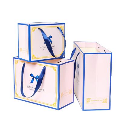 China Recyclable Personalized Paper Shopping Bag For Clothing Boutique Packaging Bags for sale