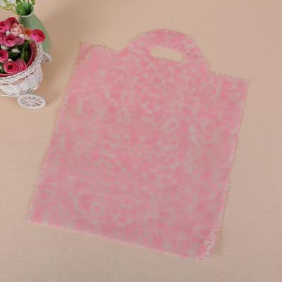 China Custom Size PE Bag Moisture Proof Pink Die Cut Handle Carry Gift Plastic Shopping Bags For Boutique for sale