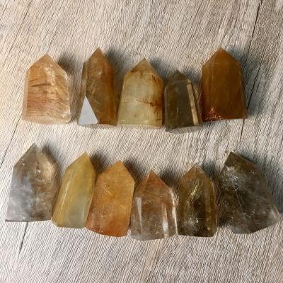 China China high quality natural healing gemstone quartz point gold rutilated crystal tower for sale