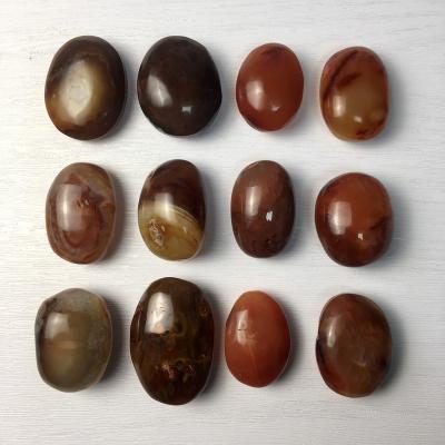 China Natural Crystal Gemstone China Quartz Healing Agate Carnelian Palm Red Stone for sale