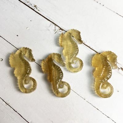 China China Hand Carved Natural Fluorite Animal Crystal Carving Yellow Seahorse For Decoration for sale